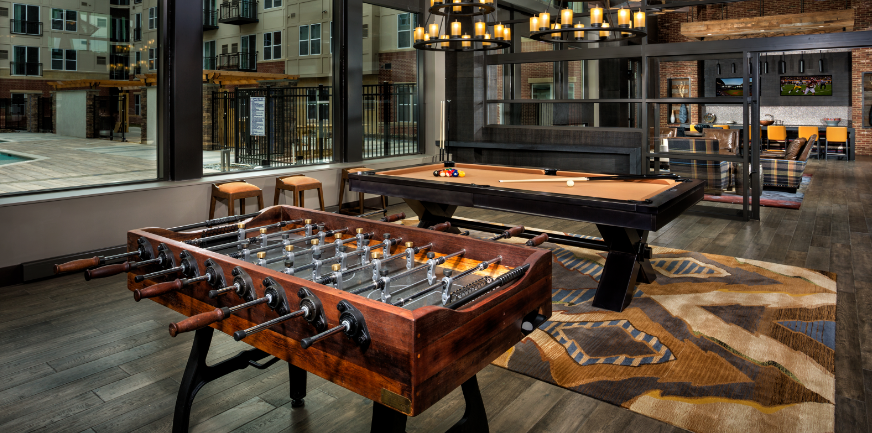 Remy game room with billiards and foosball