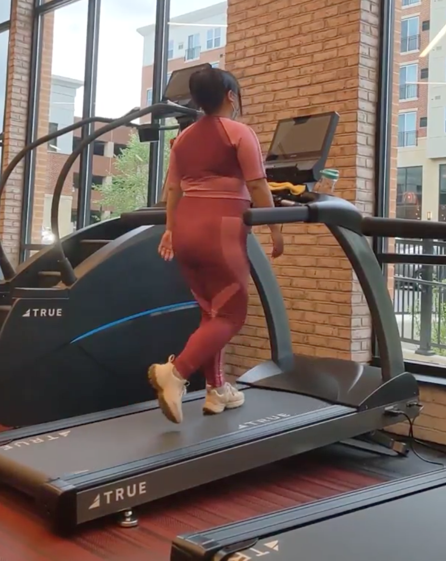 Woman walking on treadmill
