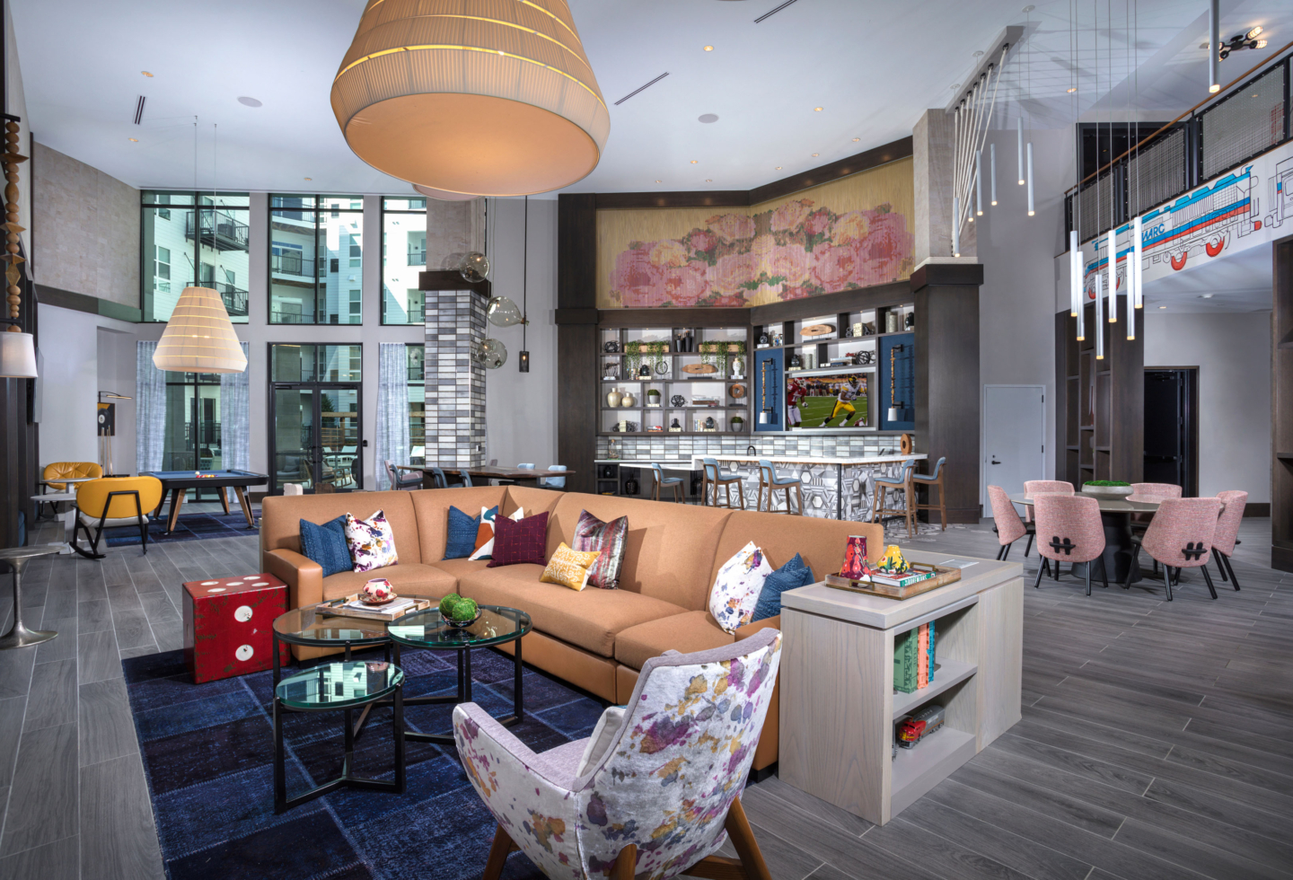 The Remy lounge with seating and bar - Lanham, MD